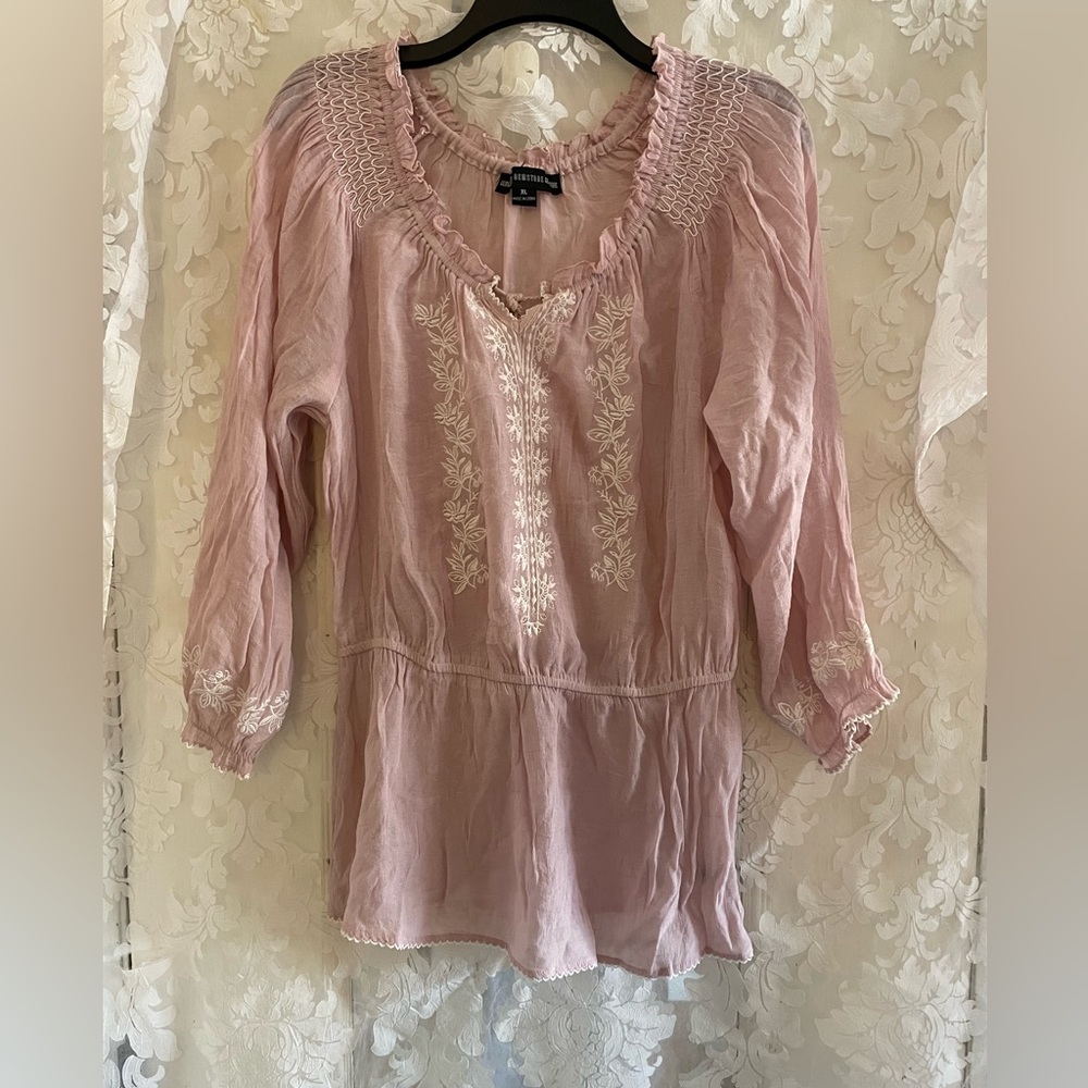 Pink long sleeve top with white accents